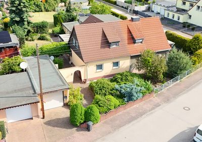 Familienfreundliches Zuhause mit begrüntem Garten, Garage und Nebengelass in Wachtendorf !