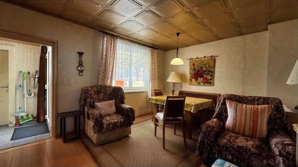 Immobilie in Weil am Rhein - Charmantes Reihenmittelhaus mit Garten und Ausbaupotenzial in zentraler Lage von Weil am Rhein - Bild 4