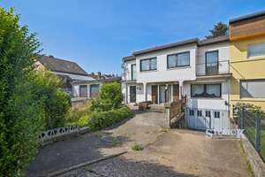 Charmantes Einfamilienhaus mit Garage und kleinem Garten