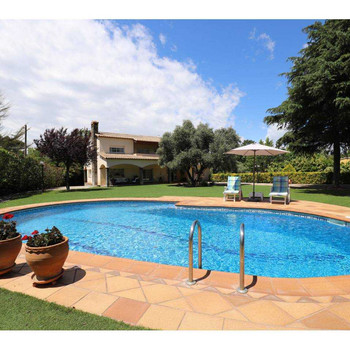 Exklusive Villa mit Pool und Baugrundstück in Can Carbonell