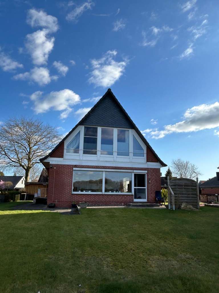 Immobilie in Osterrönfeld - Wohnen und leben in 1. Reihe am NOK!! Großzügiges Einfamilienhaus mit Einliegerwohnung! - Bild 1