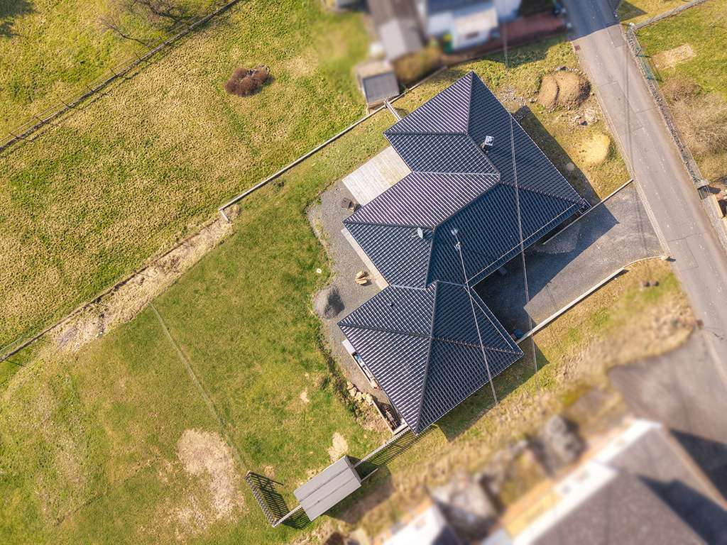 Immobilie in Bölsberg - Neubau aus 2021! Bungalow für Gartenliebhaber in idyllischer Aussichtslage - Bild 4