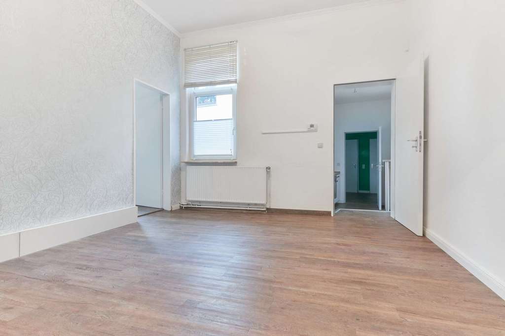 Immobilie in Achim - TOP-Vermietetes 4-Parteienhaus in sehr gepflegtem Zustand im Herzen von Achim - Bild 1