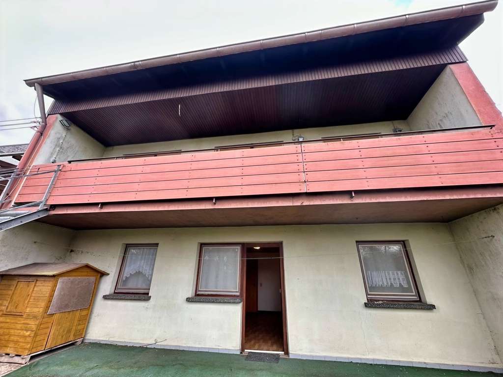 Immobilie in Merchweiler - Solides Reihenmittelhaus mit zwei Garagen  - Bild 2