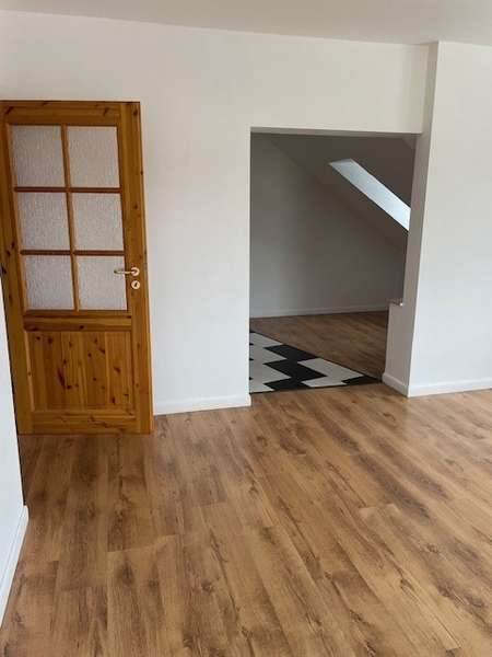 Wohnzimmer zum Essbereich
