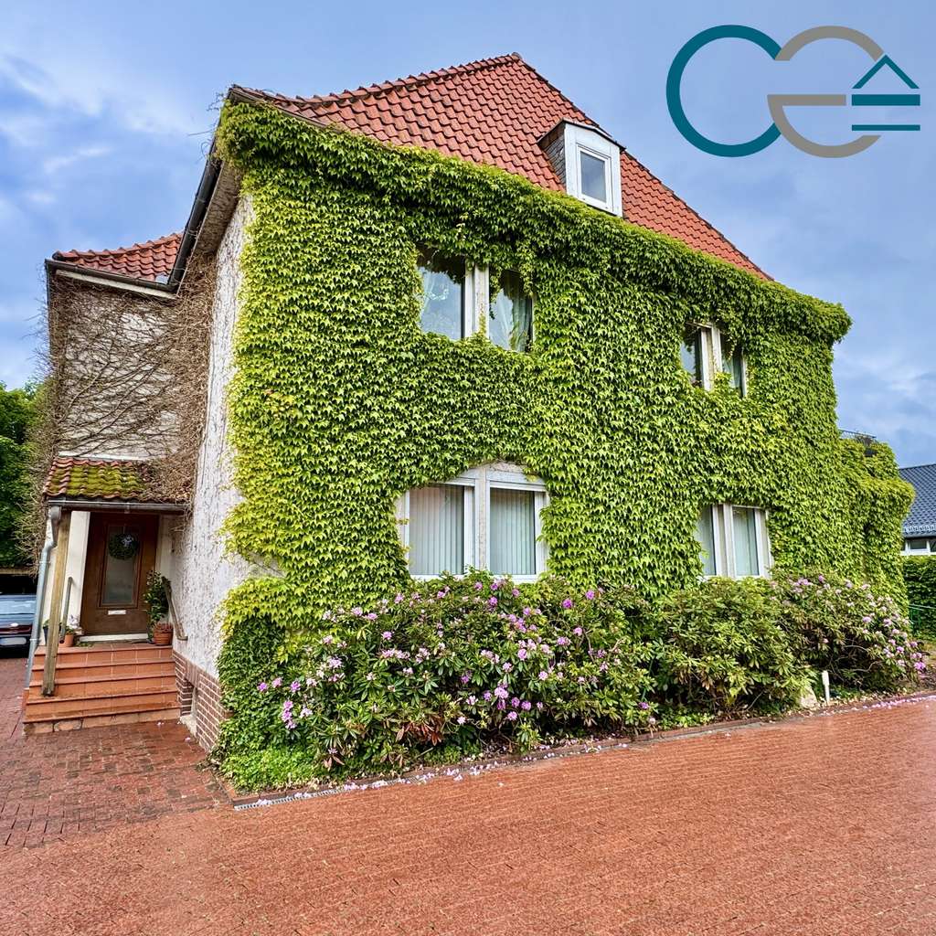 Immobilie in Stolzenau - Zweifamilienhaus mit einer Praxis, einer Wohneinheit und einem idyllischen Garten in Stolzenau! - Bild 0