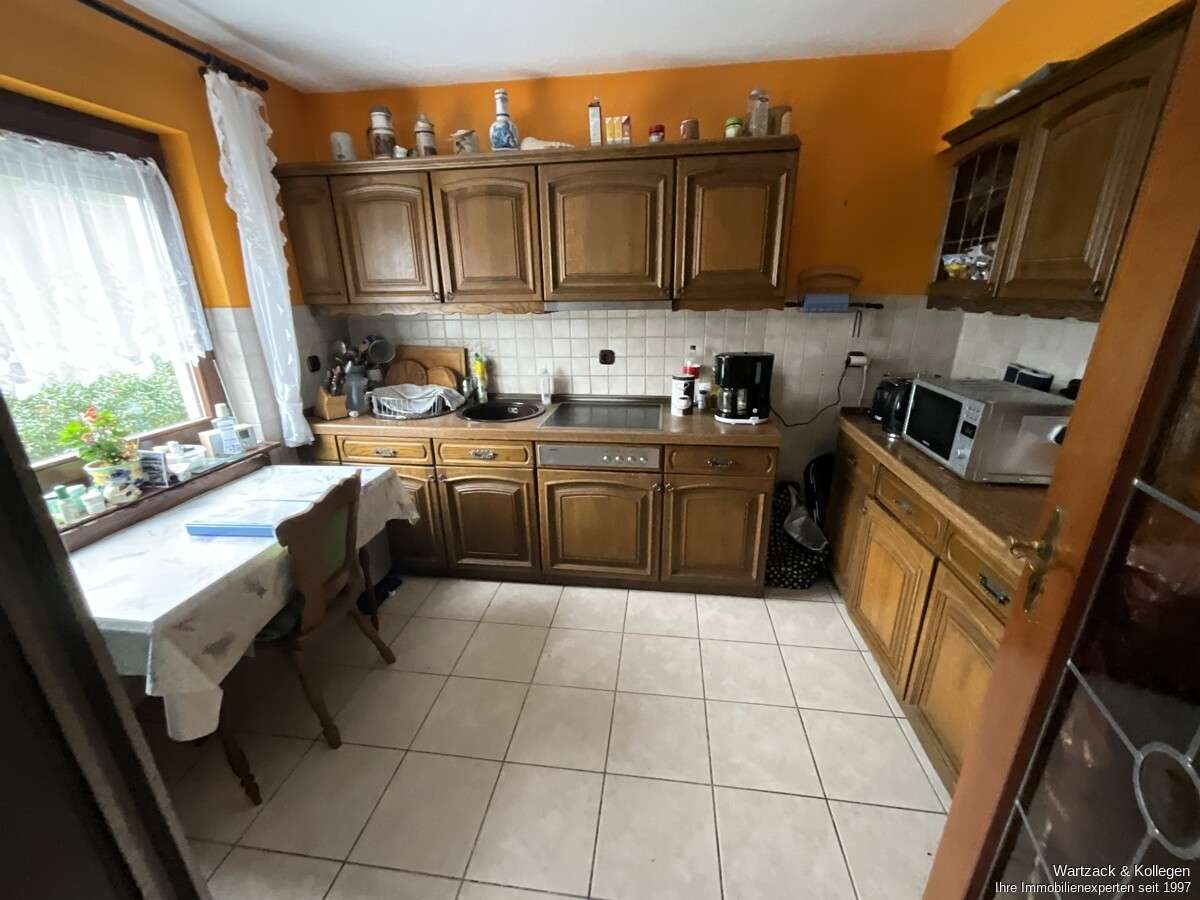 Immobilie in Schwanstetten - Reiheneckhaus mit fast 150 m² Wohnfläche, schönem Grundstück, Wintergarten und Doppelgarage - Bild 6