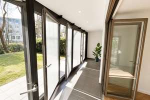 Exklusive 3-Zimmer-Gartenwohnung mit Wintergarten und Terrasse