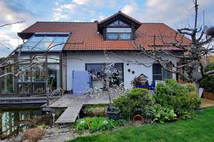 Exklusives Wohnjuwel mit Wintergarten, Wellness & Traumgarten in Hüttlingen