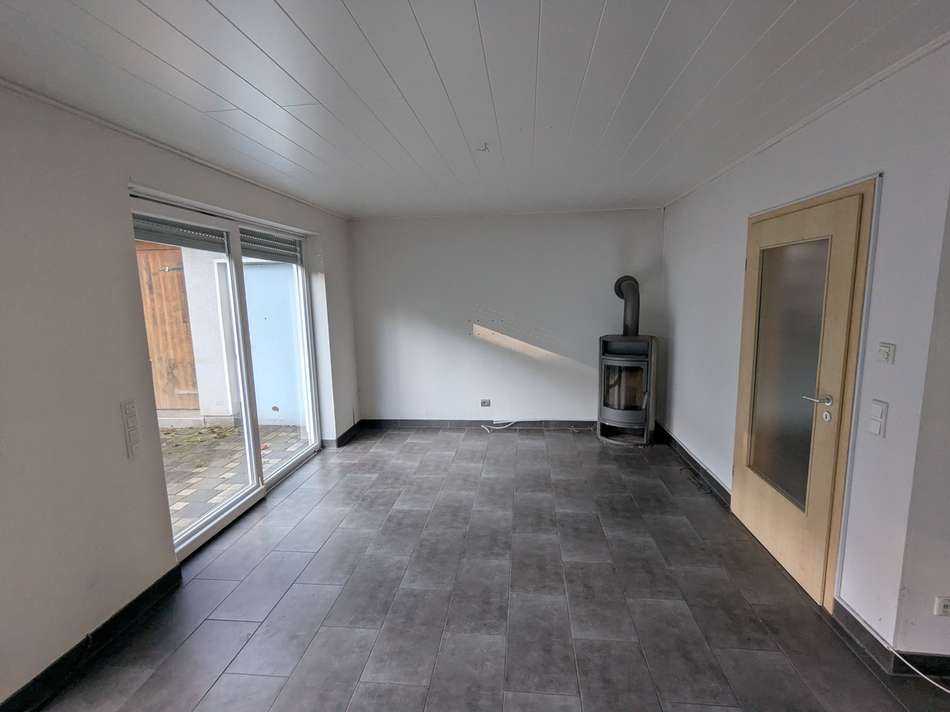 Wohnzimmer mit Kamin