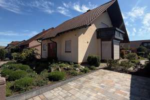 Ihr Rückzugsort im Grünen: Einfamilienhaus mit 5 Zimmern in Rülzheim – Robert-Seither-Straße 6, 76761 Rülzheim – Vorschaubild 1