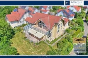 Zuhause mit Weitblick – Hochwertiges Zweifamilienhaus in begehrter Feldrandlage