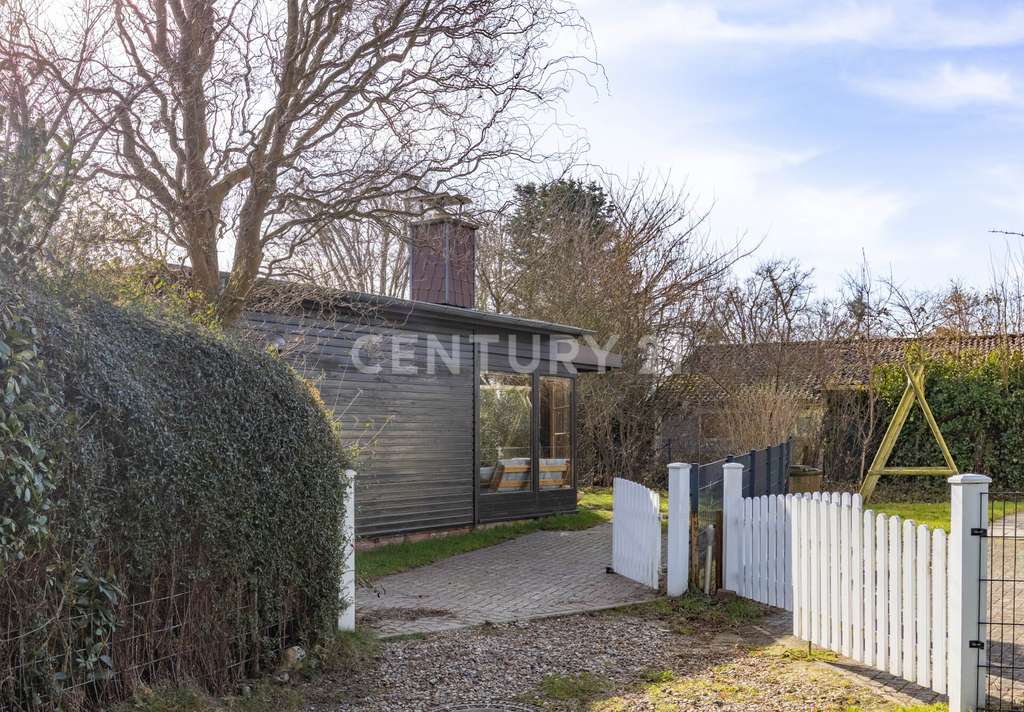 Immobilie in Hohenfelde - Wochenendhaus mit Wintergarten, Natur und Ostseenähe - Bild 1