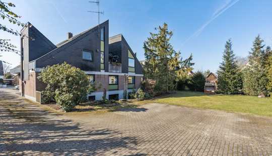 Bild von Architektenhaus mit vermieteter Praxis – Wohnen und Ertrag auf attraktivem Grundstück