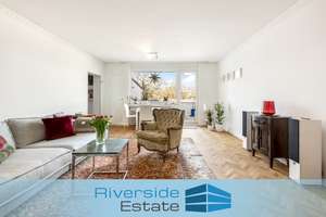 Stilvolle Stadtwohnung mit ca. 19 m² Dachterrasse, Parkett & Tiefgarage in Toplage