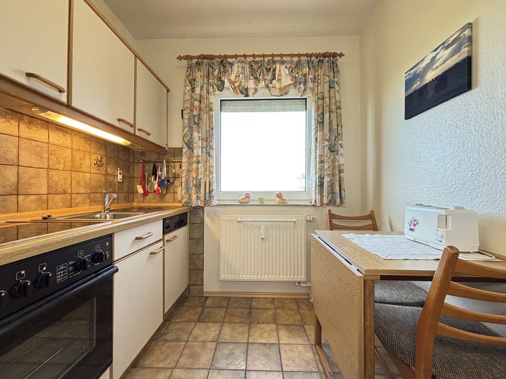 Immobilie in Dornum - Tolle, helle Oberwohnung mit großem Balkon und Weitblick - Bild 3