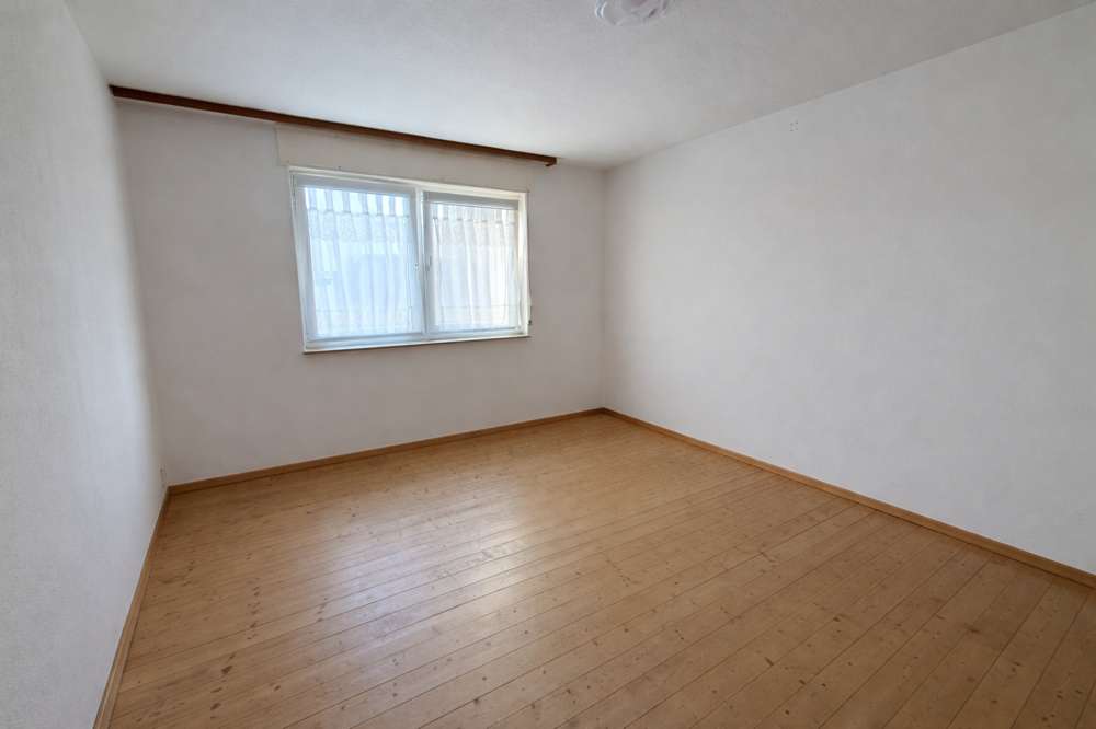 Immobilie in Eggenstein-Leopoldshafen - Attraktives Dreifamilienhäuser mit Balkonen & 2 Garagen - Bild 0