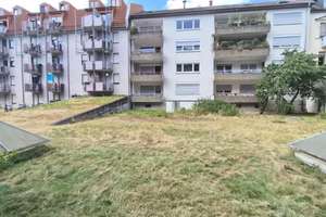 Schnuckelige 1 Zimmer Wohnung mit großem angrenzenden Garten, Küche und Tiefgaragenstellplatz