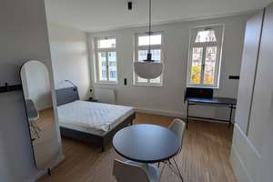 Möbiertes Design-Apartment im sanierten Altbau – direkt im Herzen Stuttgarts
