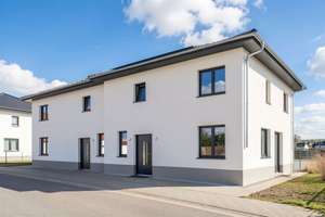 Exklusiver Neubau im KfW-40 Standard – Modernes Einfamilienhaus mit Garten & PV-Anlage