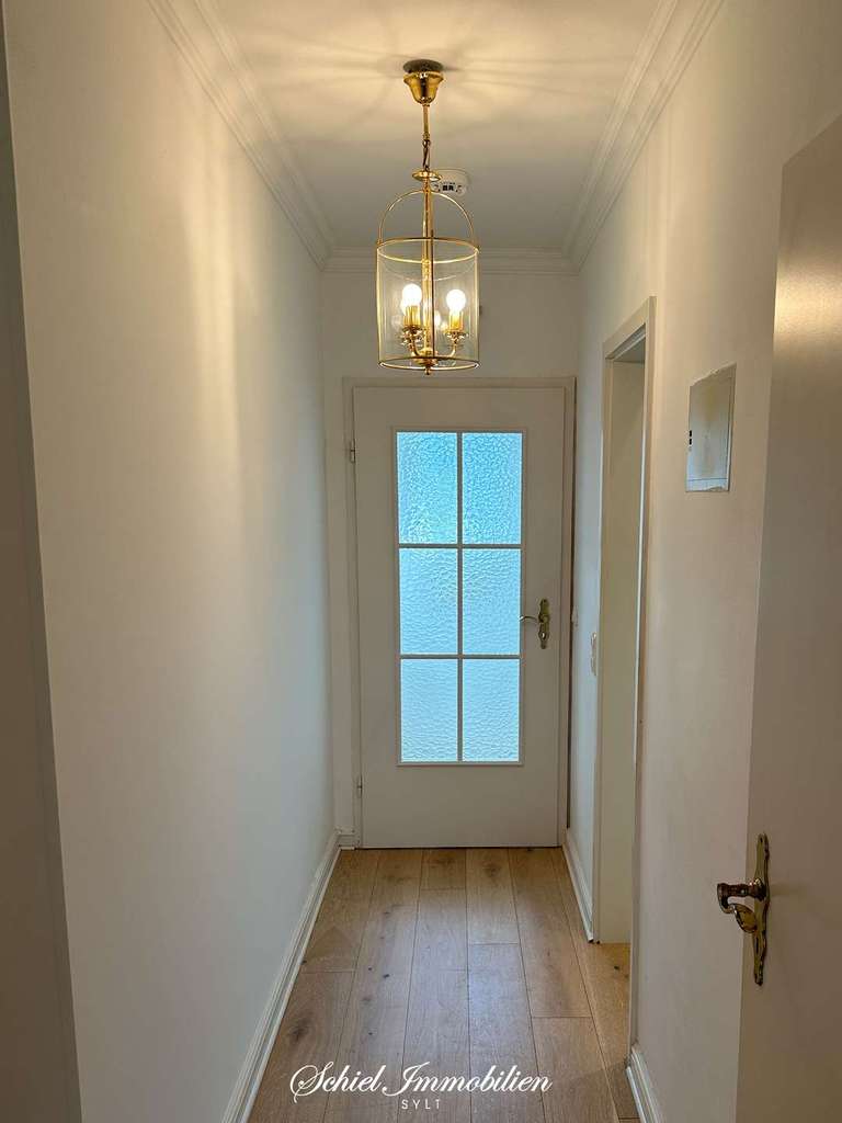 Immobilie in Wenningstedt-Braderup (Sylt) - Geräumige 2 ½-Zi.-Eigentumswohnung in ruhiger Lage,  West-Terrasse, Sauna und Pkw-Stellplatz - Bild 4