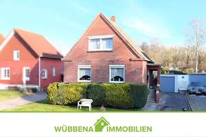 Einfamilienhaus mit Garage auf Eigentumsgrundstück in Hinte-Suurhusen zu verkaufen! – Die vollständige Adresse der Immobilie erhältst du vom Anbieter., 26759 Hinte – Vorschaubild 1