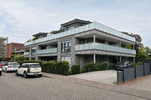 Henri-Dunant-Str. : Moderne 2-Zimmer-Erdgeschosswohnung mit Terrasse in ruhiger Lage