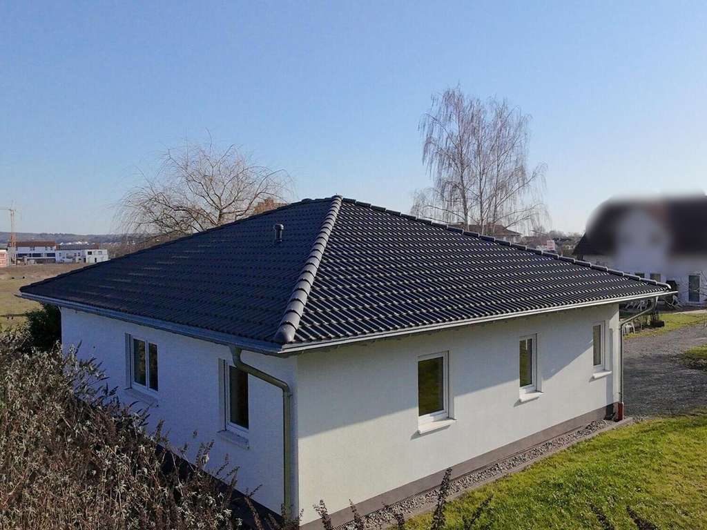 Immobilie in Weimar (Lahn) - Neuwertiger Bungalow mit Gartenfreiraum & moderner Wohnatmosphäre! - Bild 4