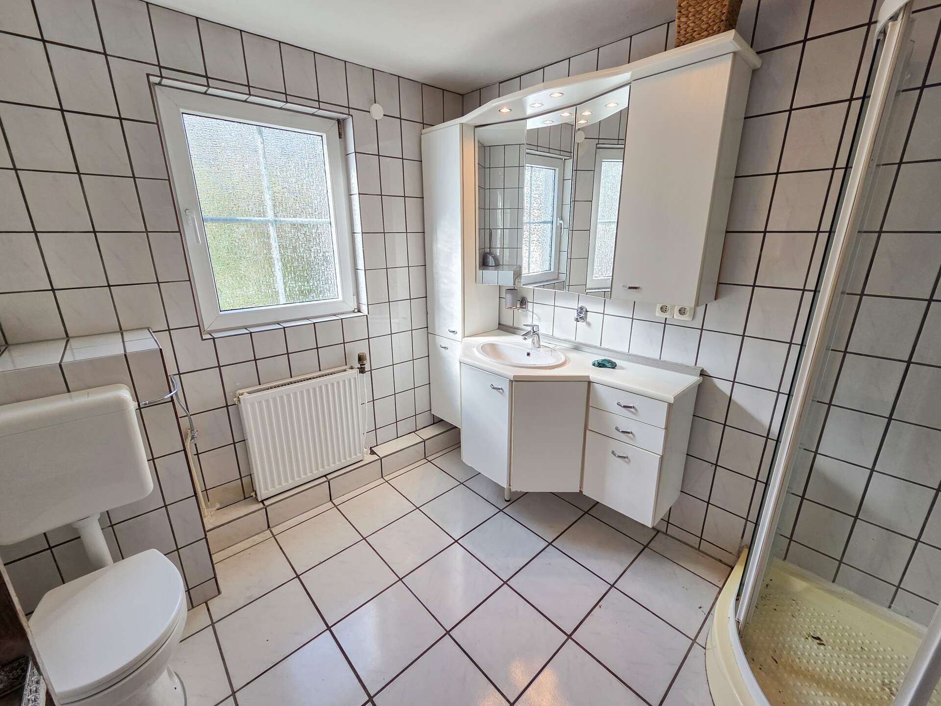 Immobilie in Birkenbeul - Mehrfamilienhaus mit großem Grundstück, ehemaligem Gewerbeteil und vielfältigem Entwicklungspotenzia - Bild 23