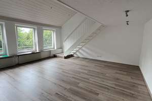 Wohnung mit Galerie, Gäste-WC, 2 Balkonen, EBK und Garage