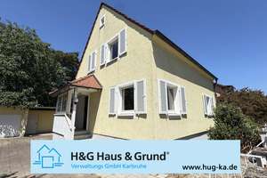 FREIWERDEND: Einfamilienhaus auf großem Grundstück und weiterer Bauplatz in Neureut-Kirc