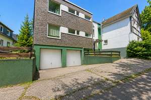 Großzügiges Zweifamilienhaus mit Garten, Photovoltaik und interessanter Rückanmietungsoption