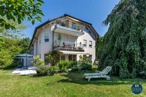 Außergewöhnliche Gartenwohnung mit großem Hobbyraum in Obermenzing