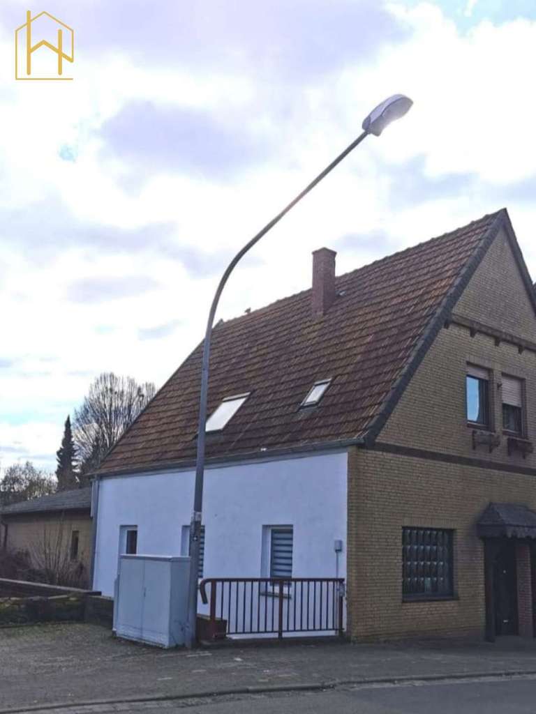 Immobilie in Melle - Solides Zweifamilienhaus mit gesicherten Mieteinnahmen und Eigennutzungspotenzial - Bild 0