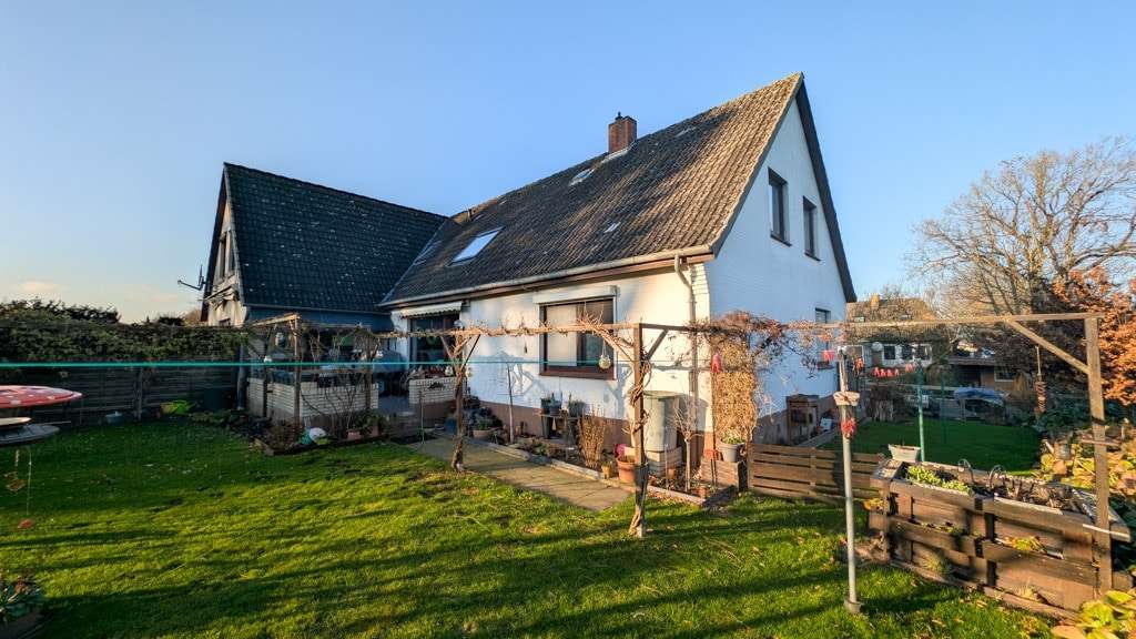 Immobilie in Fahrdorf - Vermietetes Einfamilienhaus mit großem Südgarten und Vollkeller in attraktiver Wohnlage von Fahrdorf - Bild 1