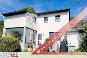 Familienfreundliches Einfamilienhaus mit schönem Garten, Terrasse und Garage