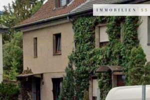 Sanierungsobjekt: Entkerntes Reihenendhaus mit genehmigter Wohnraumerweiterung