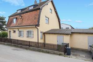 Historische „Villa Bavaria“ mit Charakter – sanierungsbedürftiges Einfamilienhaus im Heimatstil