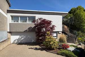 Exklusives Einfamilienhaus mit Bungalow-Charakter und traumhafter Terrasse
