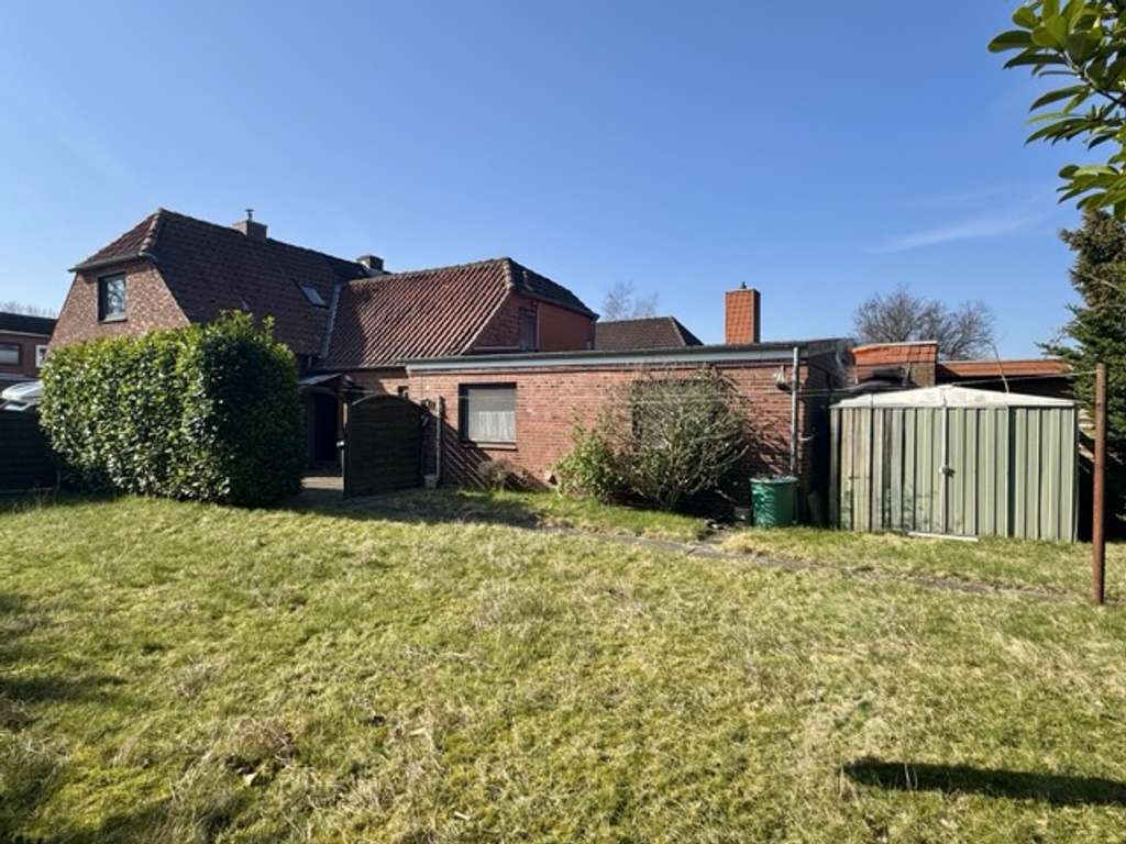 Immobilie in Heide - Verkauf einer Doppelhaushälfte in Heide mit Garten und Doppelcarport - Bild 2