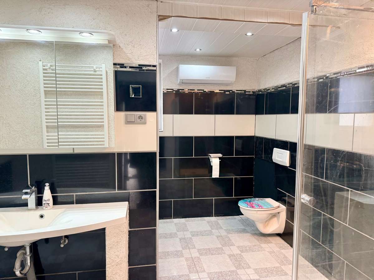 Immobilie in Lampertheim - Wohnensemble mit Charme und Potenzial im Herzen von Lampertheim-Hofheim - Bild 9