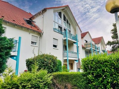 Kapitalanlage mit 5,4 % Bruttorendite – Vermietete 3-Raum-Wohnung mit Balkon und Tiefgaragenstellp