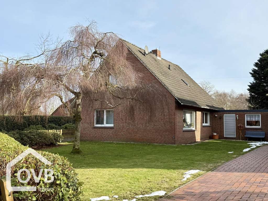 Immobilie in Moormerland - Einfamilienhaus mit Garage in Veenhusen - Bild 1