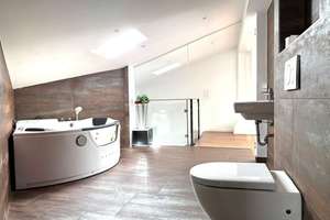 Stilvolle Maisonette-Wohnung mit eigenem Whirlpool-Highlight