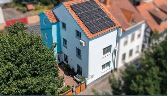 Bild von Besonderes Wohnhaus mit Ruhe-Oase, attraktiver Außenanlage und Doppelgarage