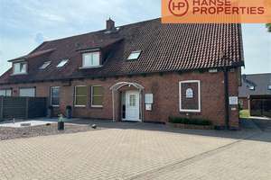 Charmante 3,5-Zimmer-Dachgeschosswohnung mit großzügigem Gartenanteil und Carport