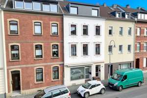Historischer Charme trifft moderne Qualität – vollvermietetes Wohn- und Geschäftshaus