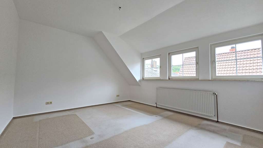 Immobilie in Rockenhausen - Attraktive Dachgeschosswohnung in direkter Innenstadtlage! - Bild 3