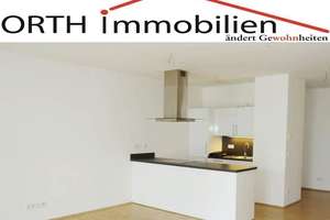 4 Zimmer Whg. mit EBK, 2 Bädern, Fußbodenheizung und Terrasse - ruhige und zentrale Lage.