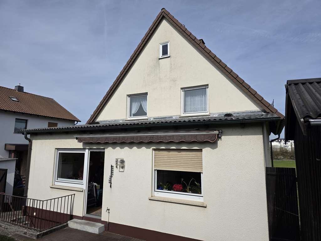 Immobilie in Hünfeld - Gemütliches Einfamilienhaus / Hünfeld Stadt / mit Garten u. Garage - Bild 1